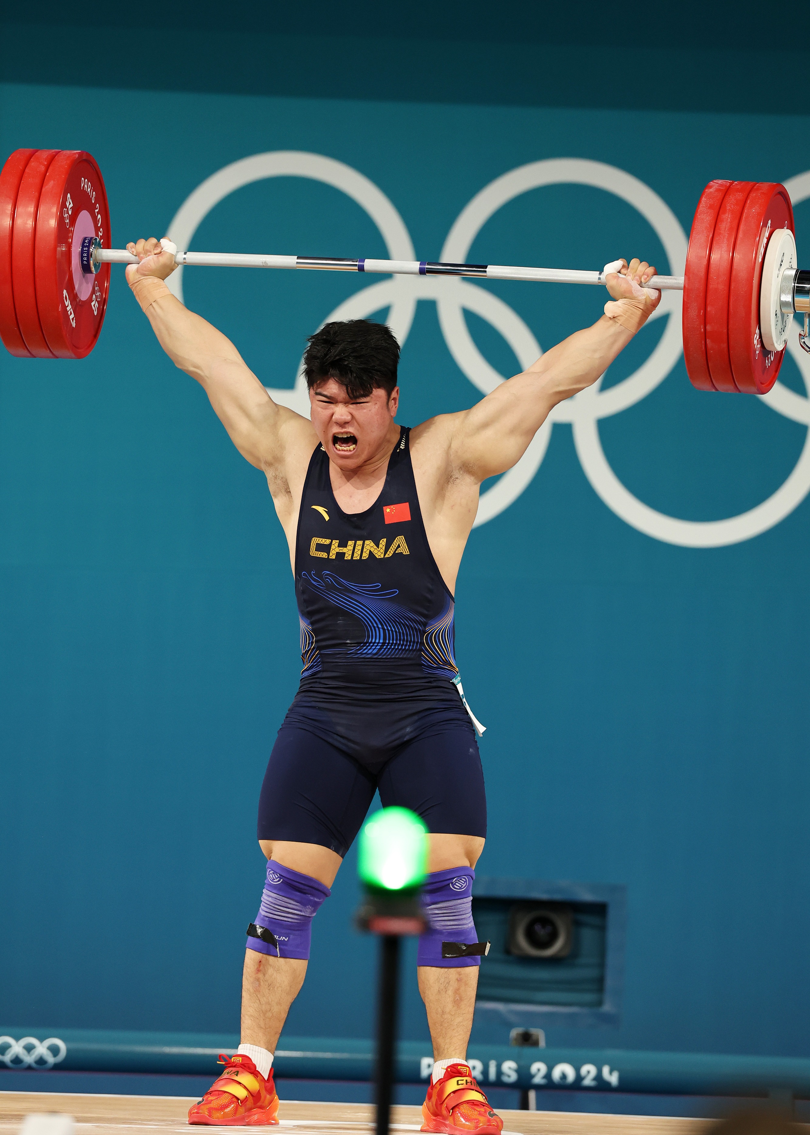 举重比赛中乌兹别克斯坦运动员勇夺金牌 举重比赛中乌兹别克斯坦运动员勇夺金牌